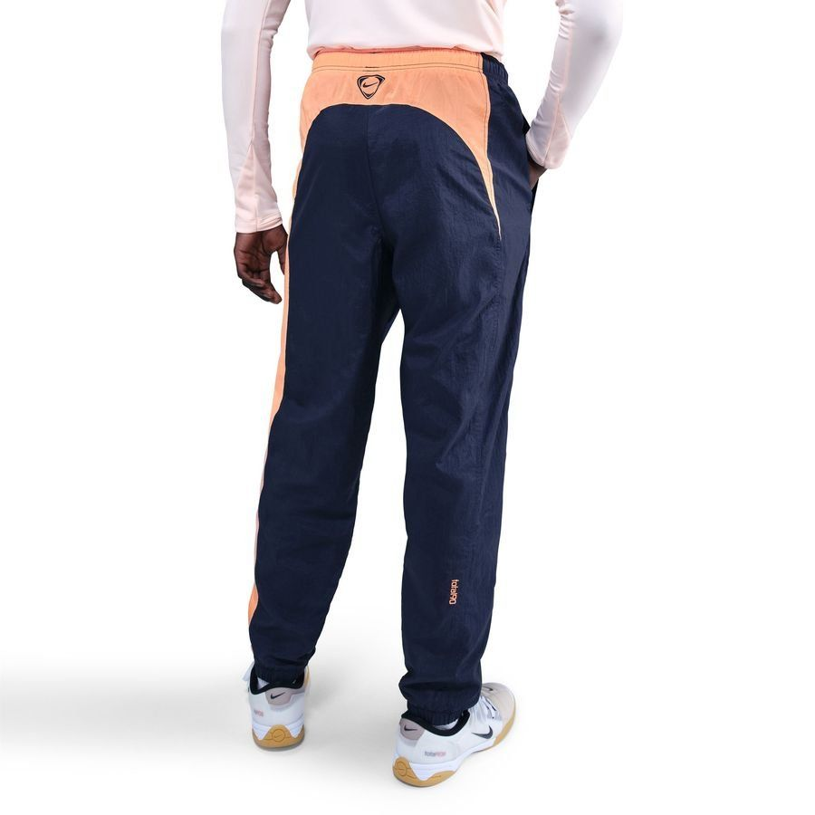 Pantalon track FC Barcelone T90 - Bleu Marine/Orange